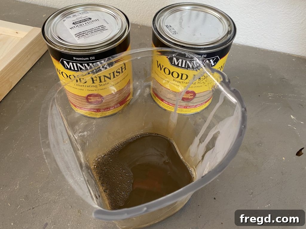 Your DIY Dry Erase Canvas 17 Custom blended Minwax stain in a bowl, ready for application