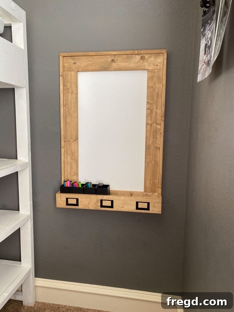 Your DIY Dry Erase Canvas 22 Front view of the finished DIY dry erase board with its elegant wooden frame and integrated tray