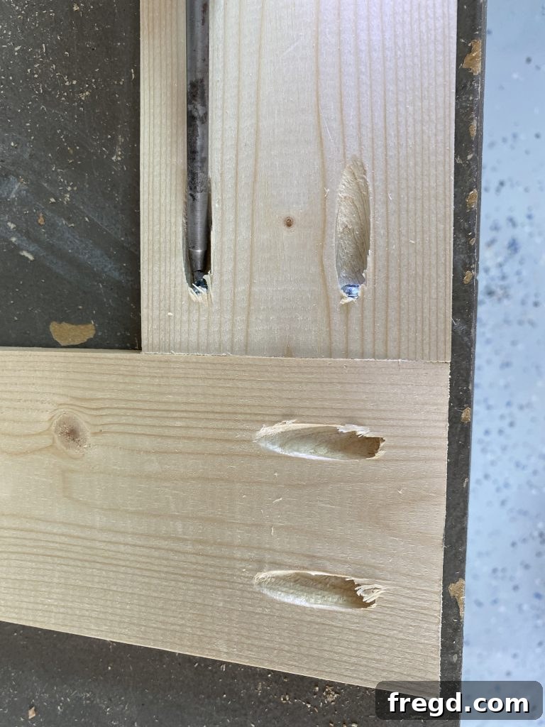 Your DIY Dry Erase Canvas 5 Close-up of pocket holes drilled into a wooden frame board