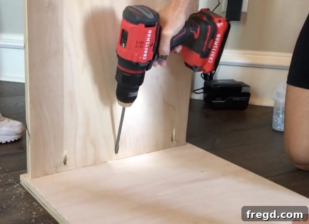 Cabinet frame pieces being assembled with pocket holes