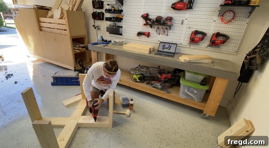 Build Your Own Square Coffee Table 6 Connecting short legs to long legs, ensuring flush alignment for coffee table stability