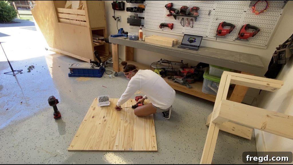 Build Your Own Square Coffee Table 8 Attaching the assembled tabletop to the sturdy coffee table base using pocket holes