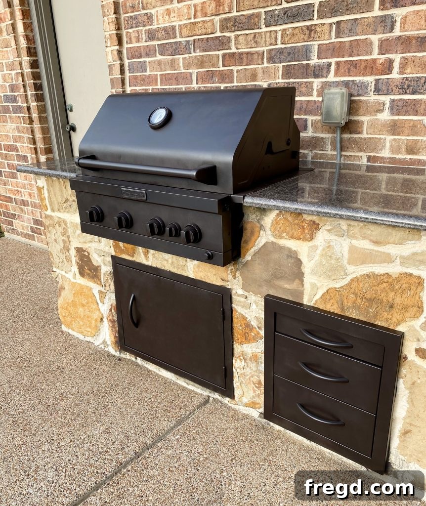 Transform Your Rusty Grill: Paint It Like New 11 After image of the outdoor grill, now beautifully painted in a sleek matte black, looking brand new and modern.