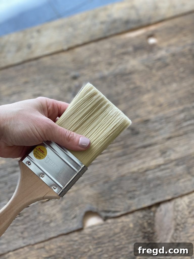 Close-up of the Purdy Chinex Elite brush's stiff bristles distributing paint evenly.