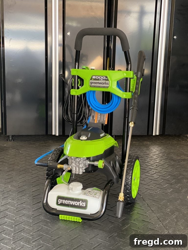 Greenworks Electric Pressure Washer effectively cleaning a patio