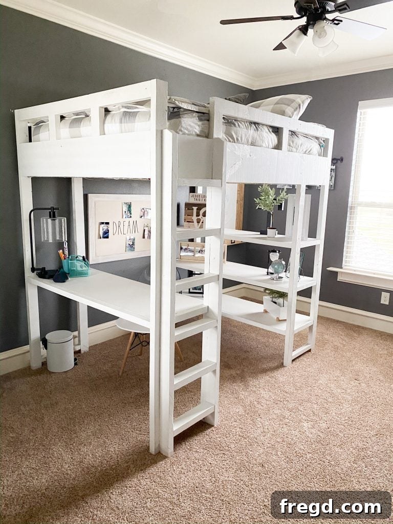 Daughter enjoying her new DIY loft bed and desk