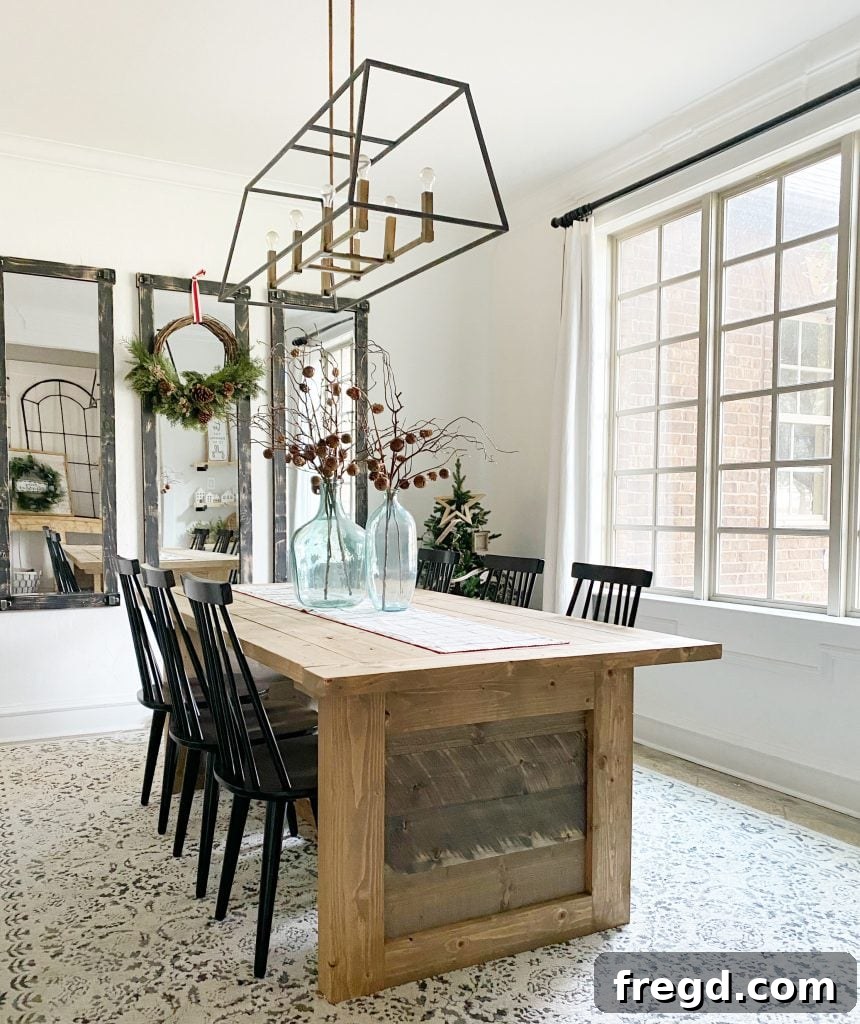 Build Your Own Paneled Farmhouse Dining Table 2 Beautifully crafted DIY Farmhouse Panel Dining Table in a bright dining room setting.