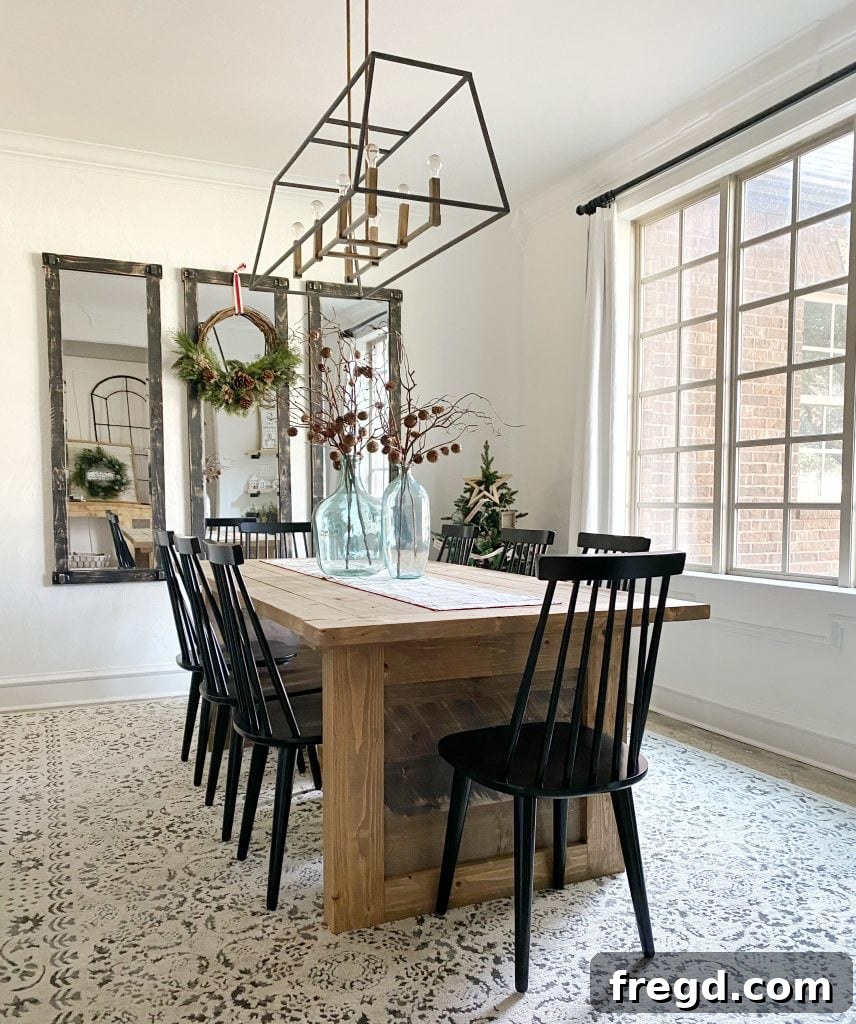 Build Your Own Paneled Farmhouse Dining Table 3 Close-up view of the farmhouse dining table's rustic top and sturdy legs.