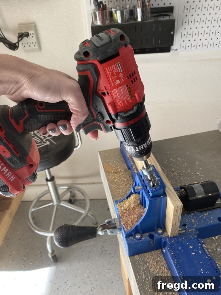 Precisely cut lumber pieces laid out for the DIY stocking holder project, showing the various components before assembly.