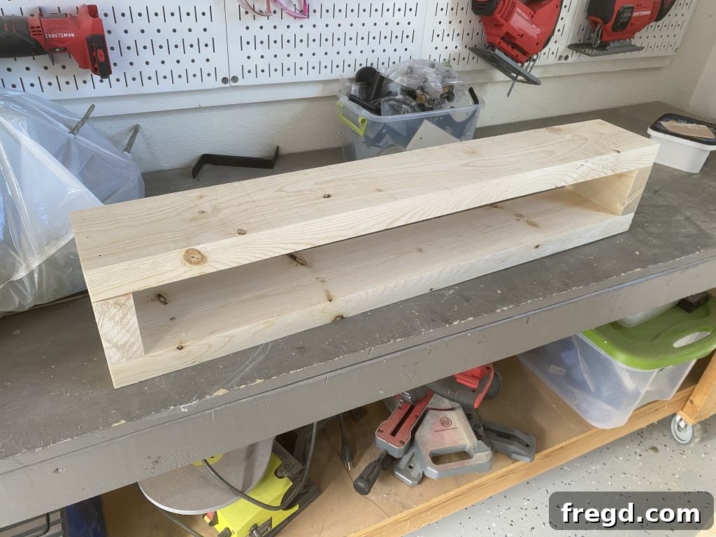 The fully assembled wooden box of the stocking holder, showing all four sides joined cleanly and securely.