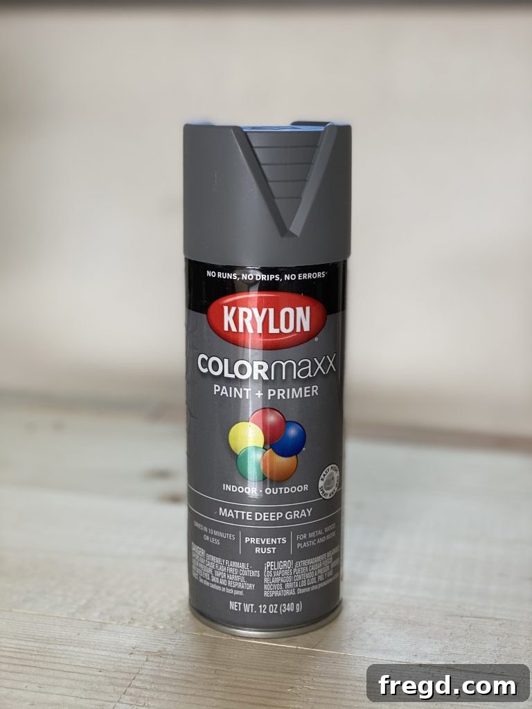 Can of Krylon ColorMaxx Paint and Primer Spray Paint in Matte Deep Gray, highlighted for its smooth application.