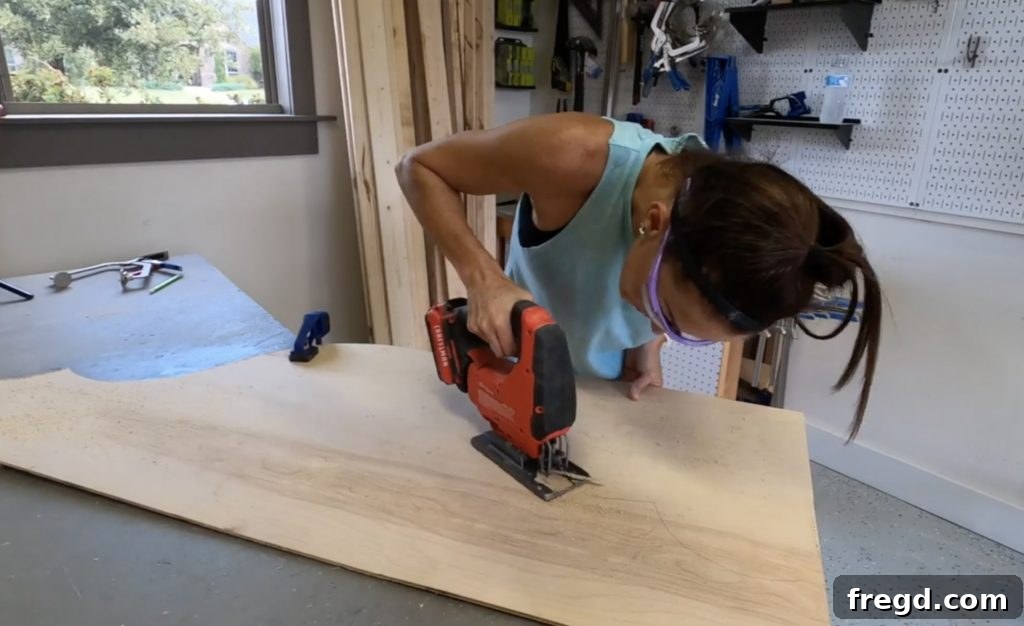 Build Your Own Designer Full Bed 10 Cutting bottom headboard trim with a jigsaw