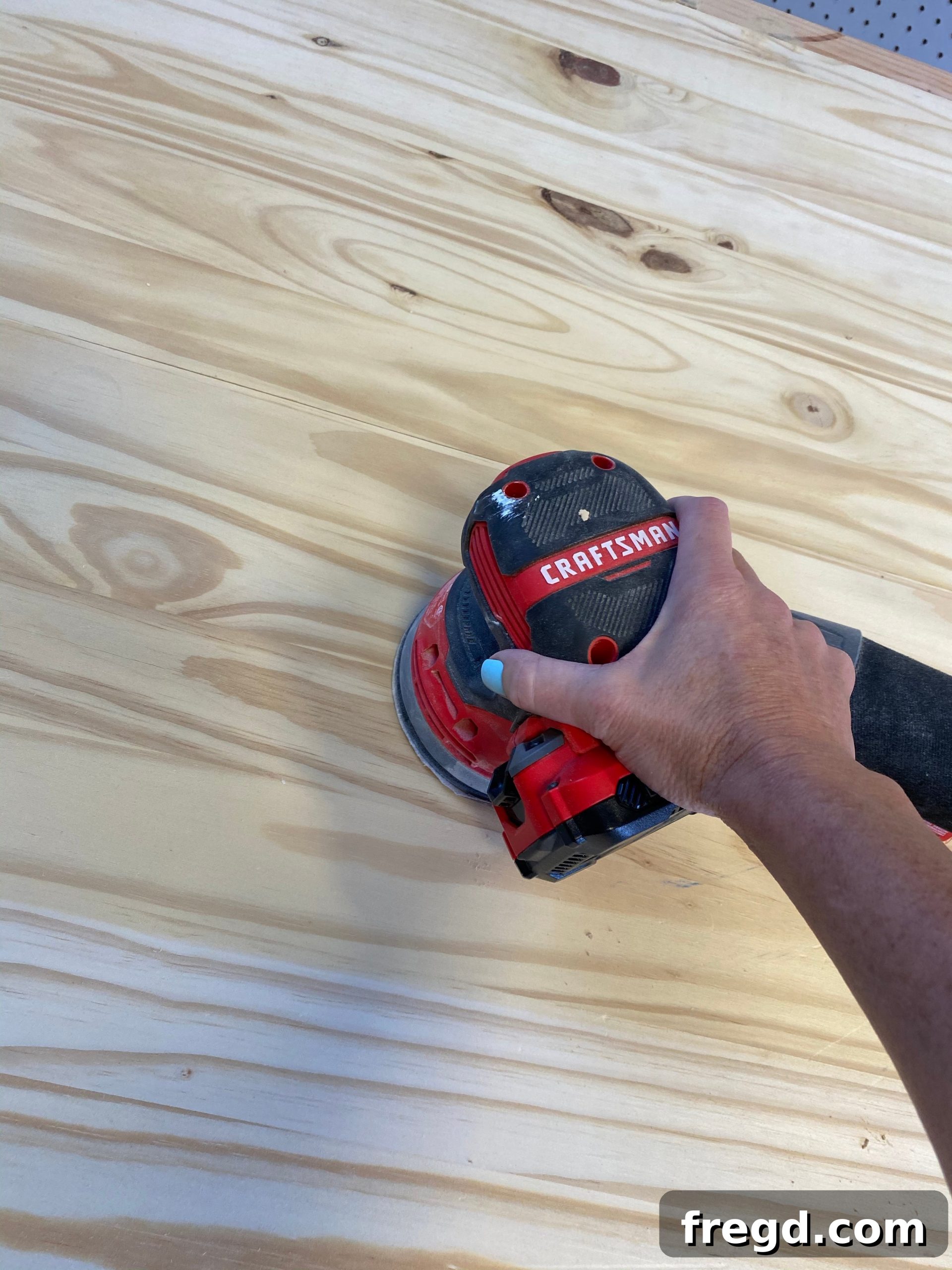 Craft Your Own Square Coffee Table 13 Sanding the coffee table and applying wood conditioner