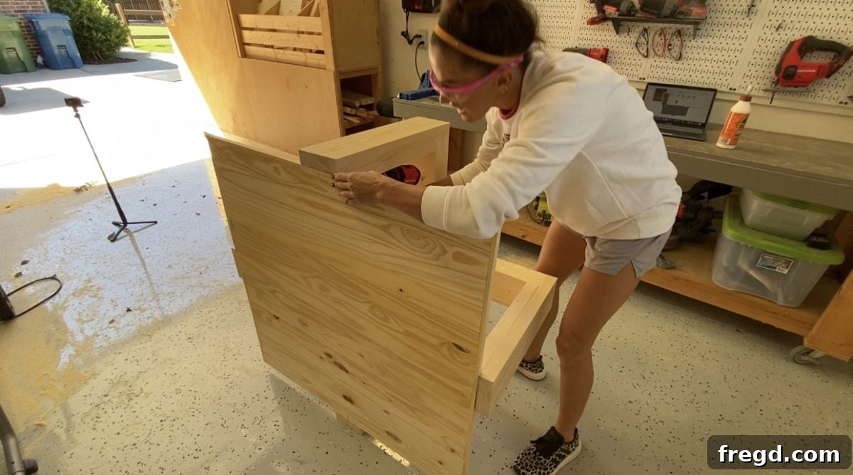 Craft Your Own Square Coffee Table 10 Attaching the table top to the base frame