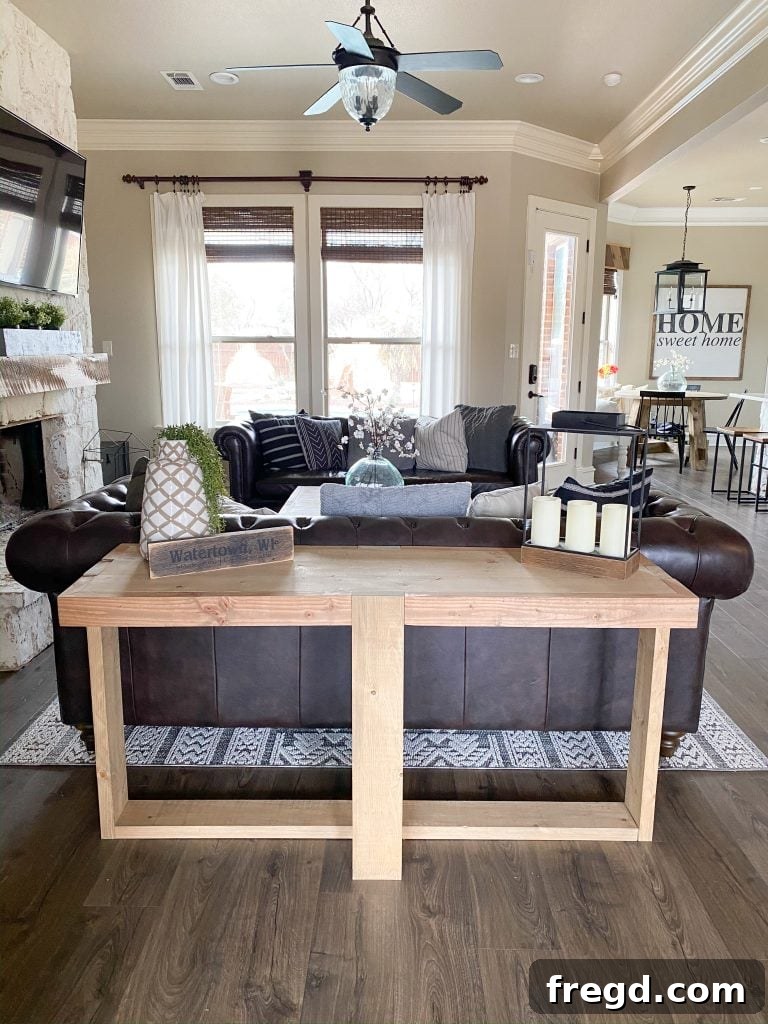 Farmhouse Fresh: Build Your Own Console 14 Stylish console table adorned with decorative elements in a modern farmhouse setting.