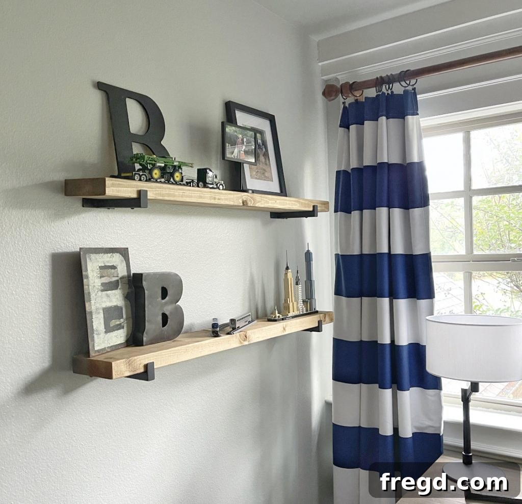 Inexpensive DIY Wall Shelves 2 Finished DIY wall shelves displaying books and decorative items in a boy's room
