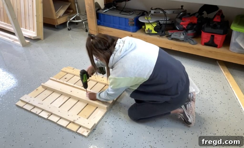 Attaching the slider and spacer blocks to the top slat assembly