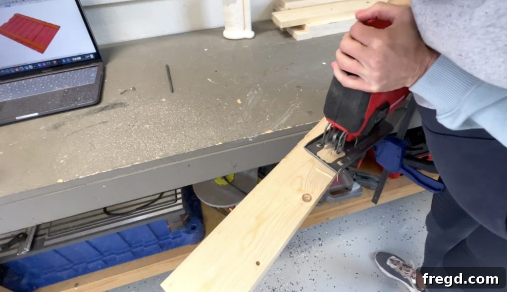 Cutting a handle slot in the top slat with a jigsaw