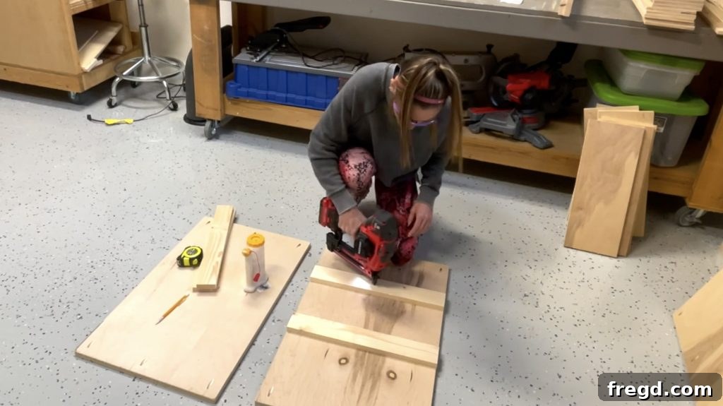 Vertical dividers and cleats cut to size and drilled with pocket holes for the cabinet frame.