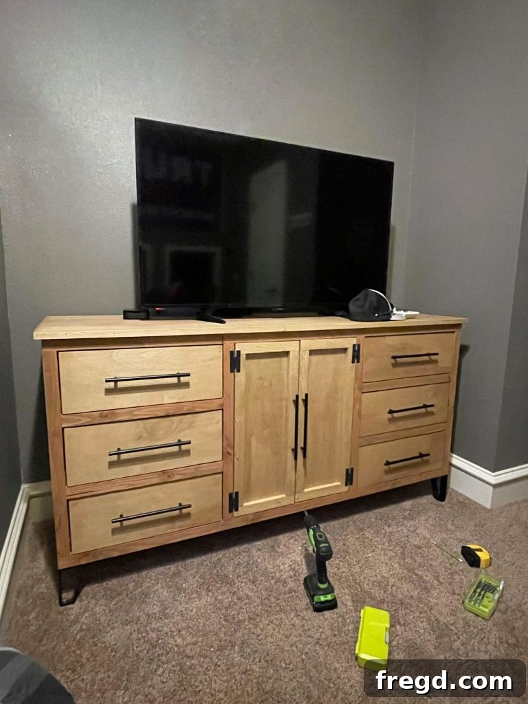 Front view of the completed DIY modern dresser.