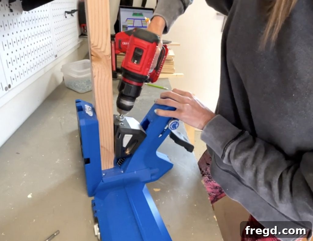 Drilling 1 1/2 inch pocket holes for the face frame pieces.