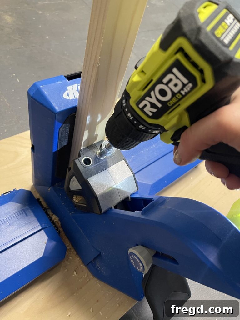 A single 1x3 board cut to length with pocket holes drilled on both ends for use as a table support.