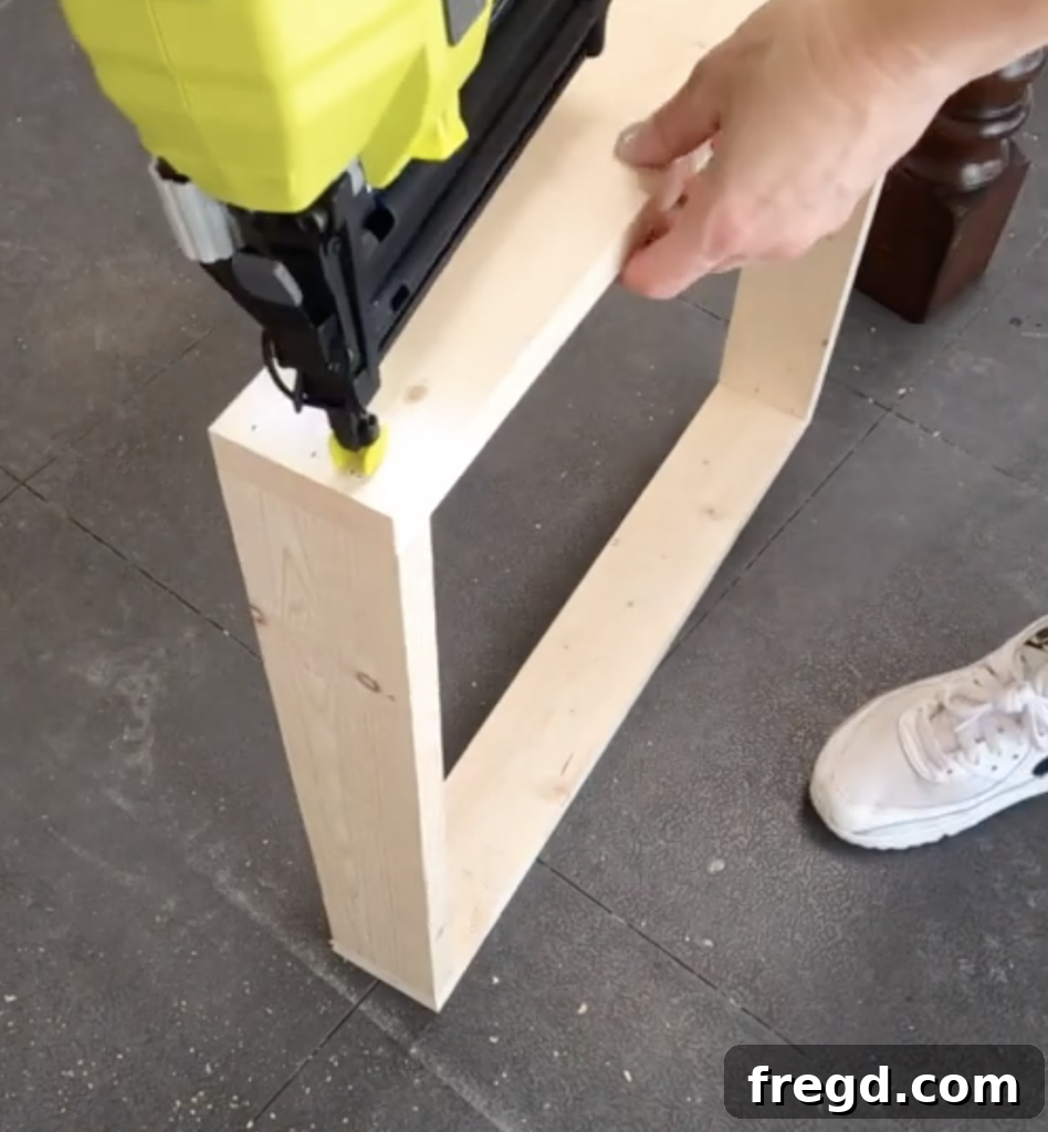 Build Your Own Modern Farmhouse Desk 15 Assemble the drawer box sides using wood glue and brad nails