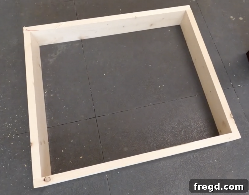 Build Your Own Modern Farmhouse Desk 16 Close-up of drawer box construction with brad nails and wood glue