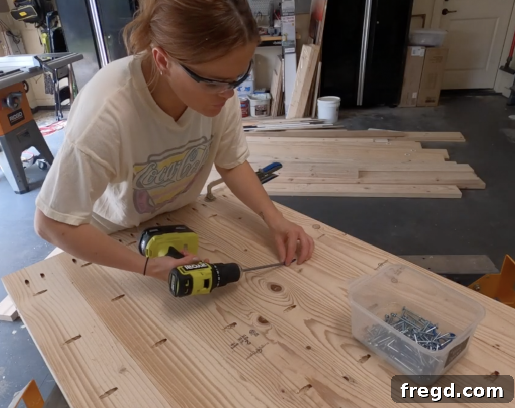 Build Your Own Modern Farmhouse Desk 7 Attach desk planks using 2.5-inch Kreg pocket hole screws for a strong desktop
