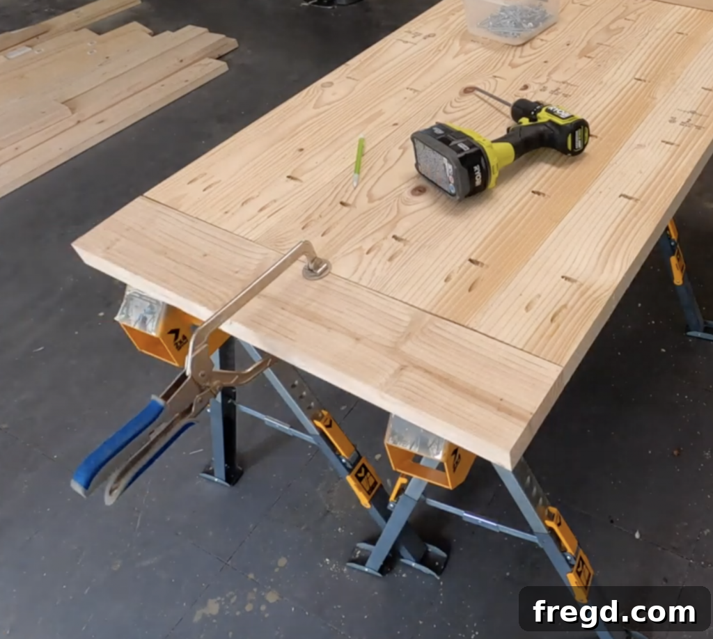 Build Your Own Modern Farmhouse Desk 9 Use Kreg Face Clamp to hold breadboard in place while attaching to desk