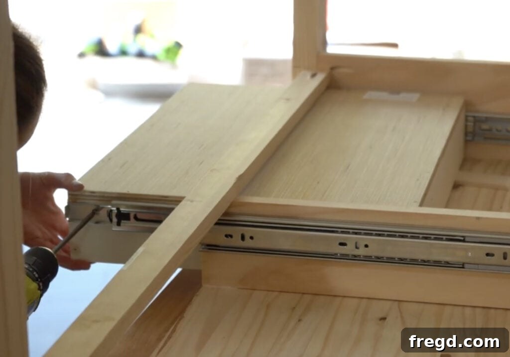 Installing drawer slides inside the desk frame