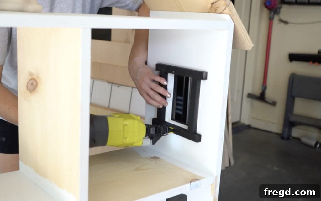 Craft a Charming Dollhouse Book Nook 12 Attaching window frames to the window cutouts on the dollhouse bookcase