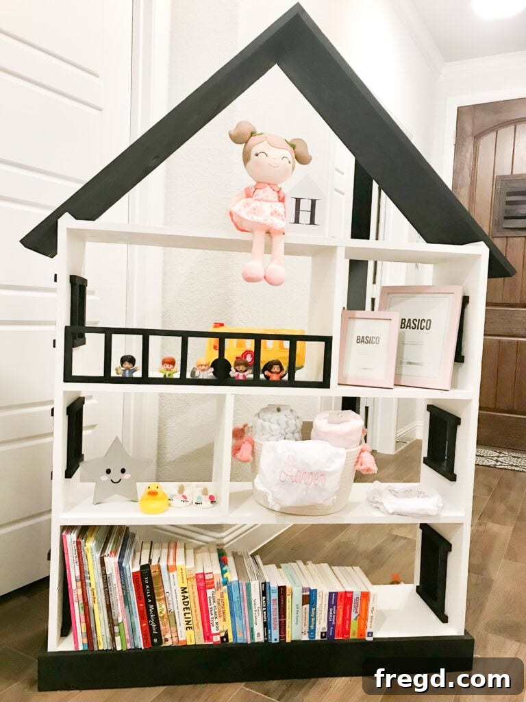 Craft a Charming Dollhouse Book Nook 21 A wide shot of the DIY playhouse bookcase, emphasizing its size and appeal