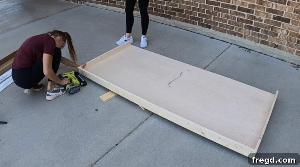 Craft Your Own Canopy Bed 30 Attaching top and bottom trim to the headboard