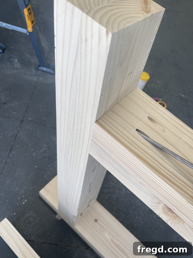 Laminating bottom horizontal support boards with glue and screws.