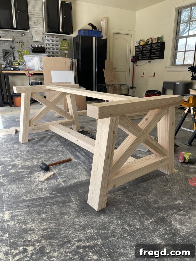 Attaching the final top runner to complete the base.