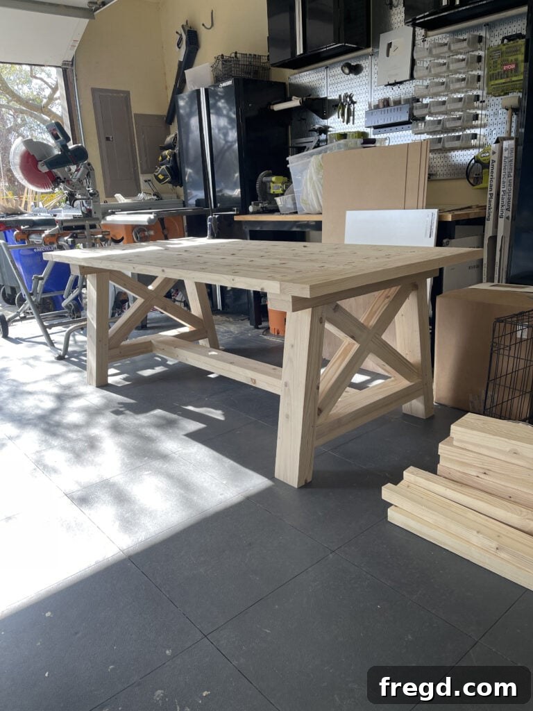 Attaching the finished tabletop to the X-base.