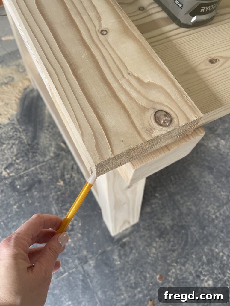 Close-up of pocket hole joinery for tabletop assembly.