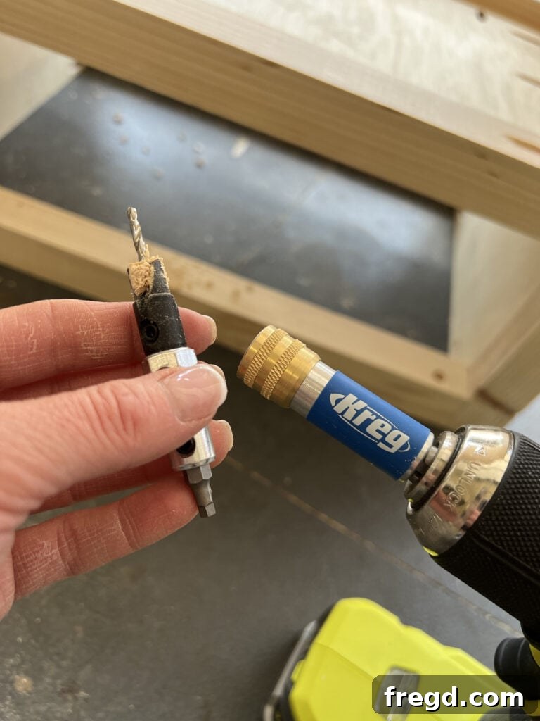 Flipping the Kreg Quick-Flip to switch to the square bit driver.