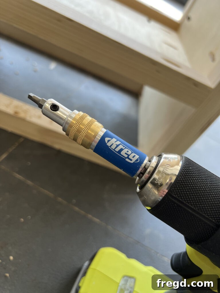 Driving screws into the nightstand top using the Kreg Quick-Flip.