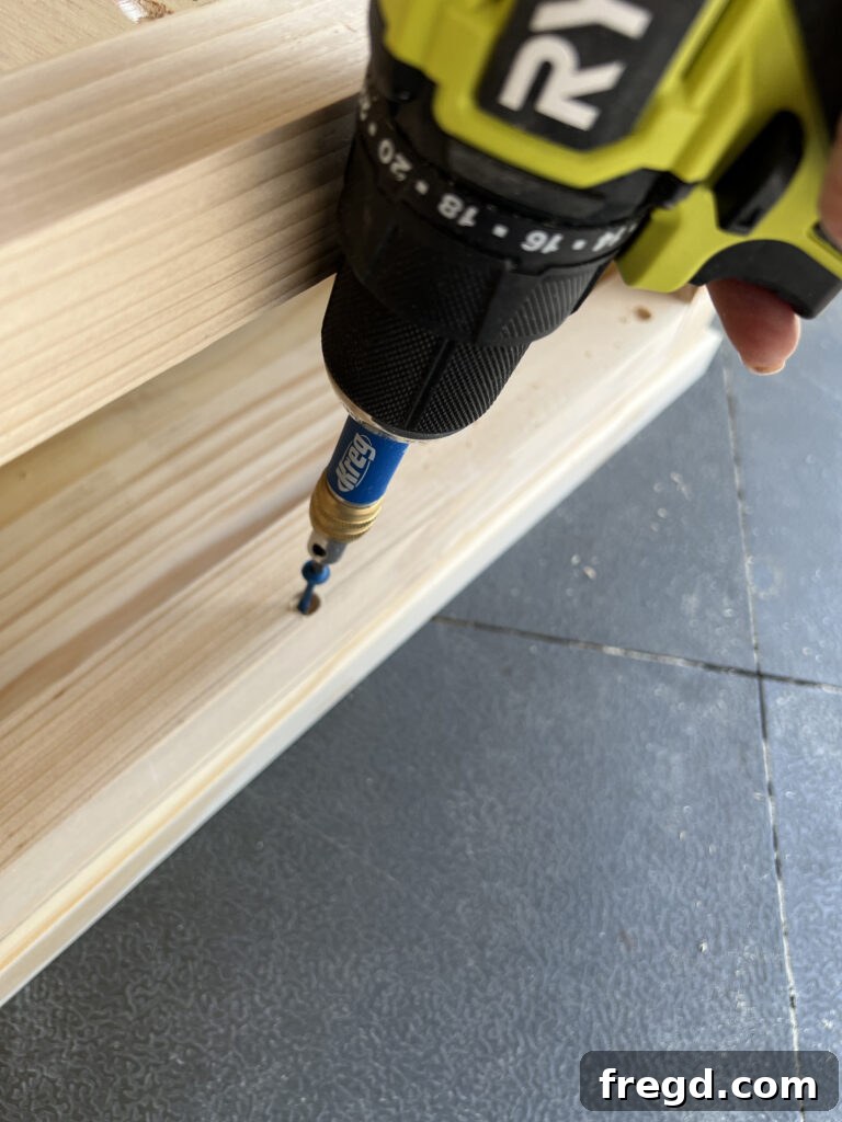 Underside view of the nightstand top securely attached to the frame.