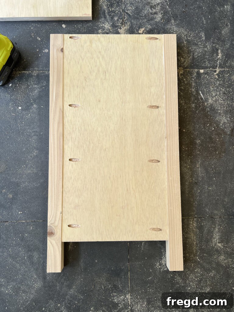 Side view showing inner flush alignment of plywood and leg.
