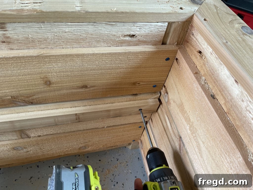 Customizing planter box depth by raising internal cleats