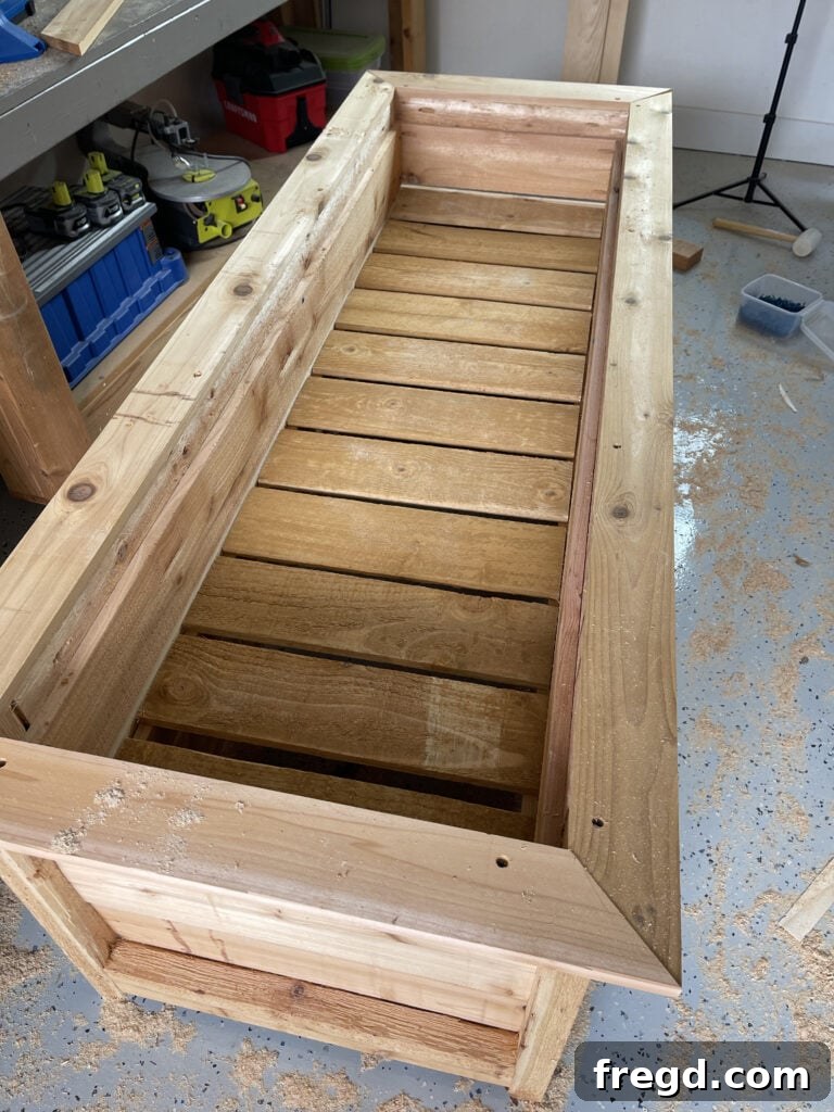 Attaching bottom slats to raised cleats for a shallower planter