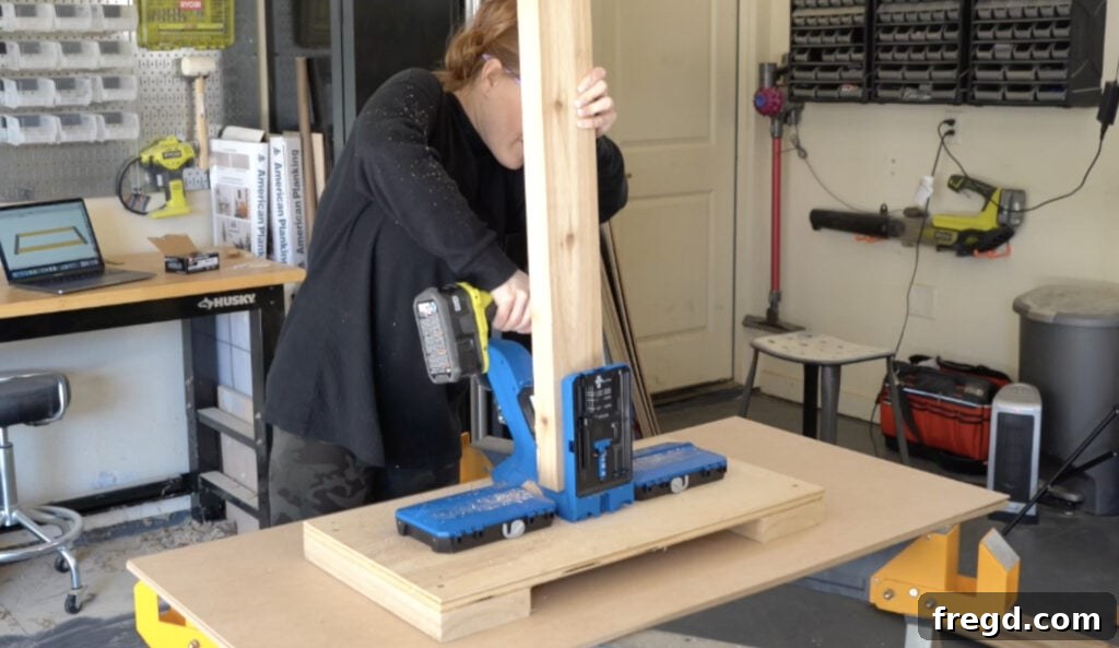 Drilling pocket holes into cedar frame pieces for planter box