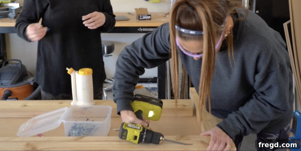 Assembling the long side frames of the cedar planter box