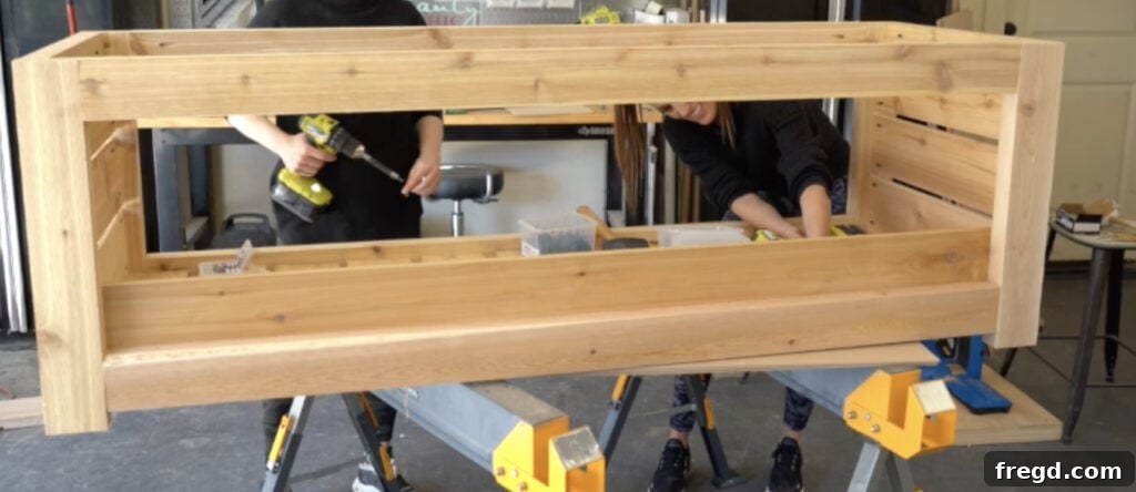 Attaching long slats to the inside of the planter box frame