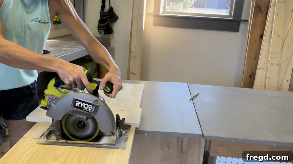 Cutting a square piece of wood with a circular saw.
