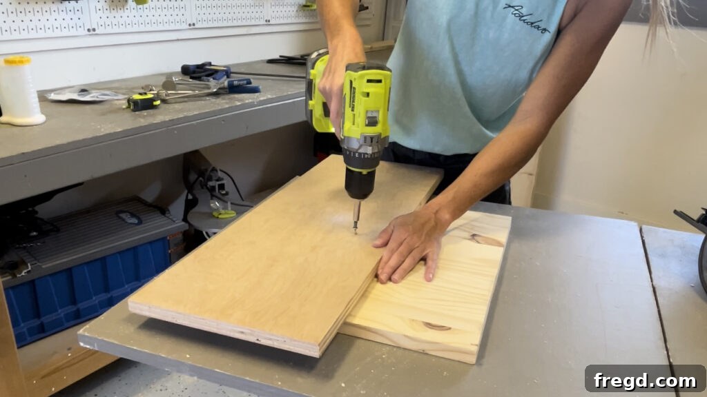 Attaching a scrap board to the center of a square as a pivot.