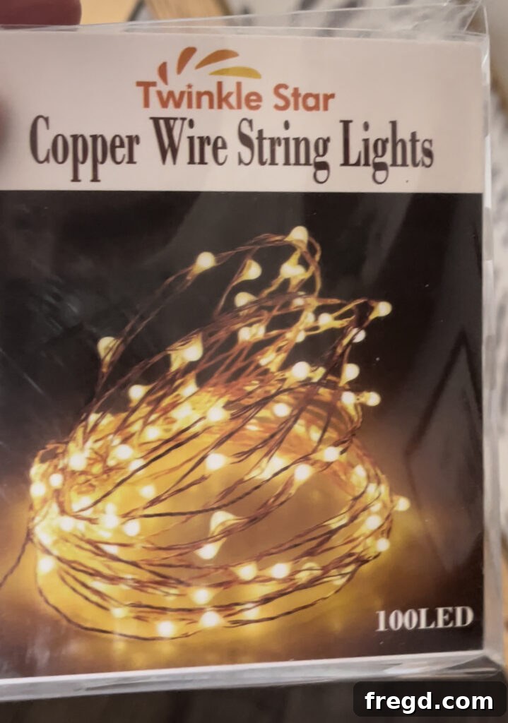 Adding string lights inside the DIY dog bed for a cozy ambiance